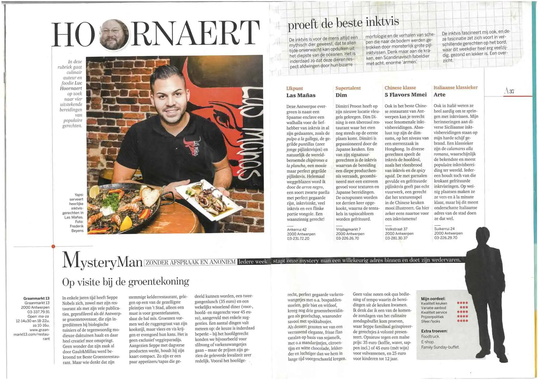 Een man poseert met smaakvolle inktvisgerechten in het restaurant Las Mañas in Antwerpen, bekend om zijn innovatieve en wereldgerechten met verse inktvis en Scandinavische invloeden.